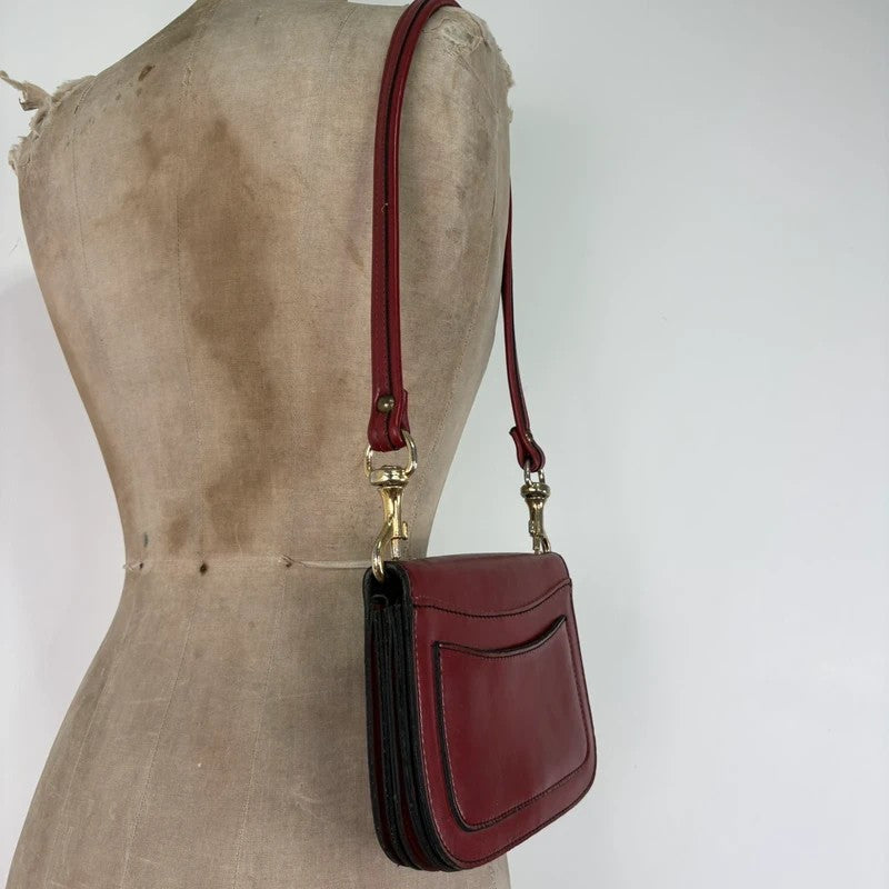 Red leather minimalistic shoulder handbag