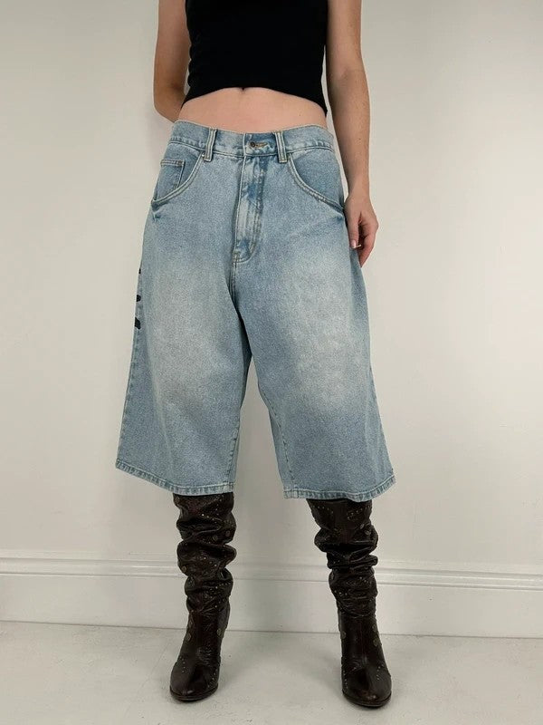 oversized wide leg denim jorts with graphic print