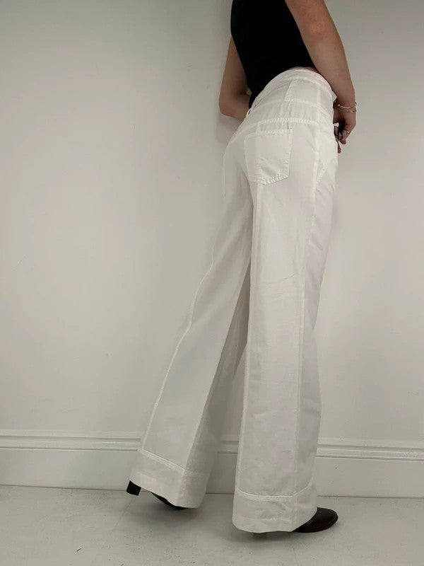 white flared wide leg button front cotton trousers