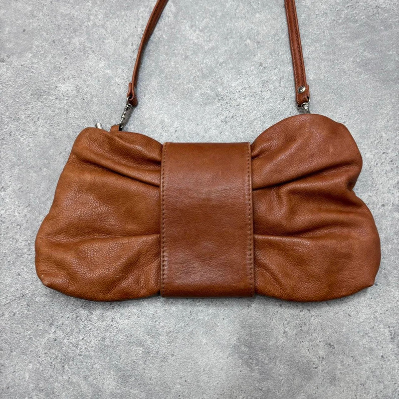 brown leather bow shoulder bag