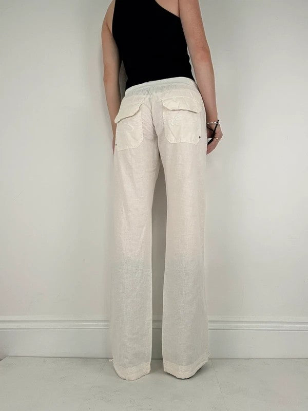 White low rise wide leg flared linen trousers