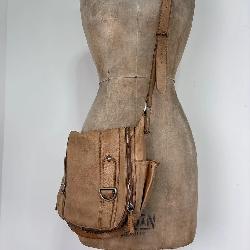 Tan distressed leather zip city crossbody D-ring bag