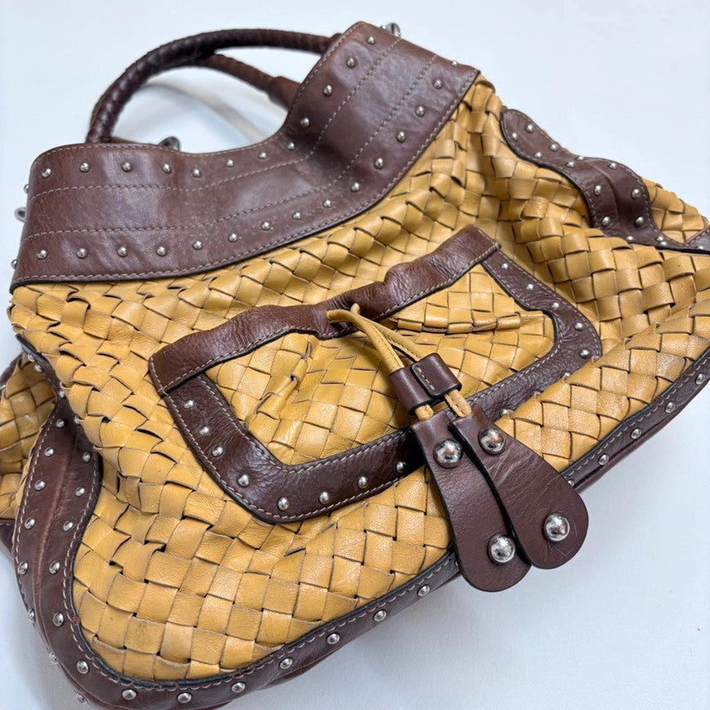 woven leather studded slouchy shoulder bag