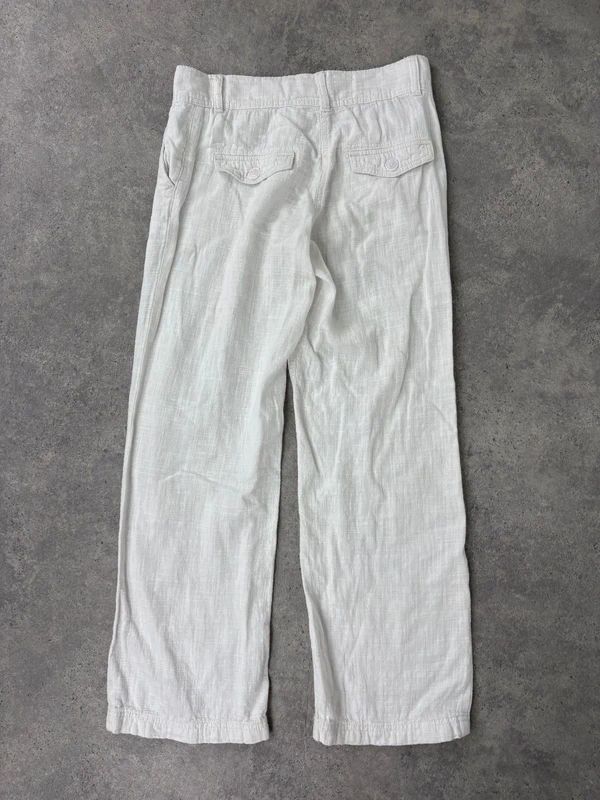 white linen wide leg low rise trousers