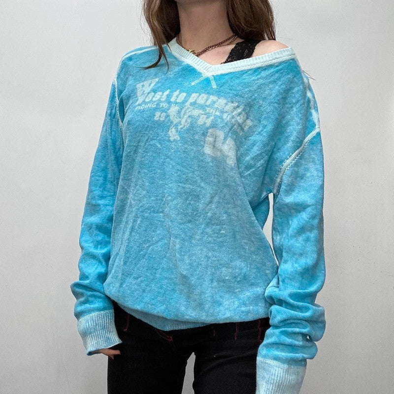 Slouchy oversized distressed knit jumper