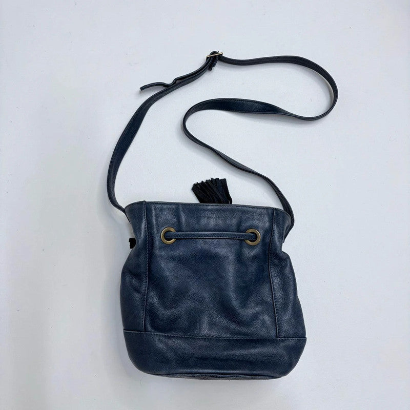 navy blue tassle bucket bag