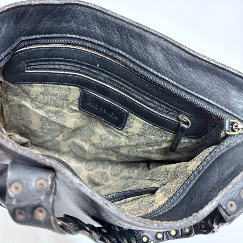 black leather studded eyelet bag
