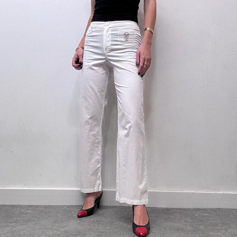 white minimalist flared trousers