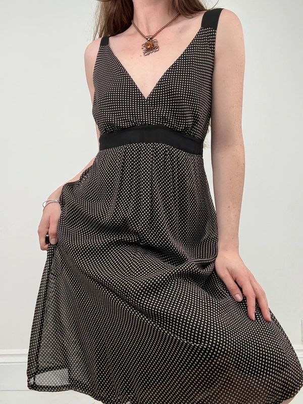black polkadot flared midi dress