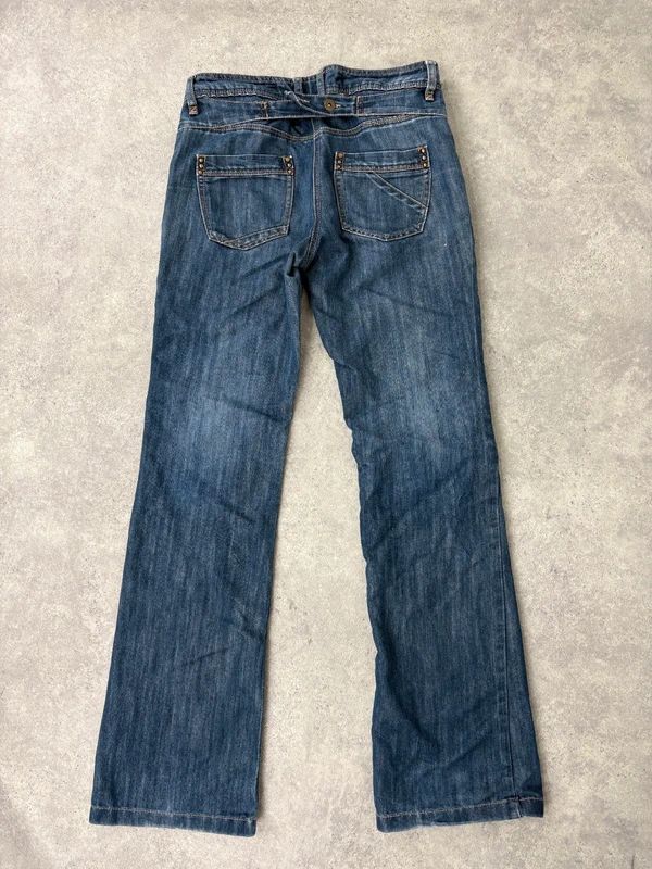 Low rise distressed buckle back Jeans
