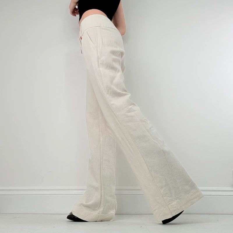 white flared wide leg thick waistband trousers