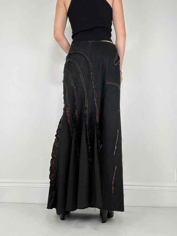 Flared black distressed maxi skirt