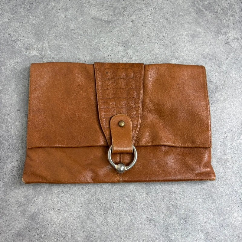 tan lather piercing punky silver hardware clutch bag