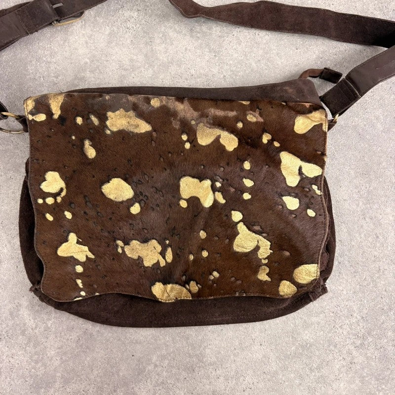 Brown cow hide leather satchel bag with gold embellishment