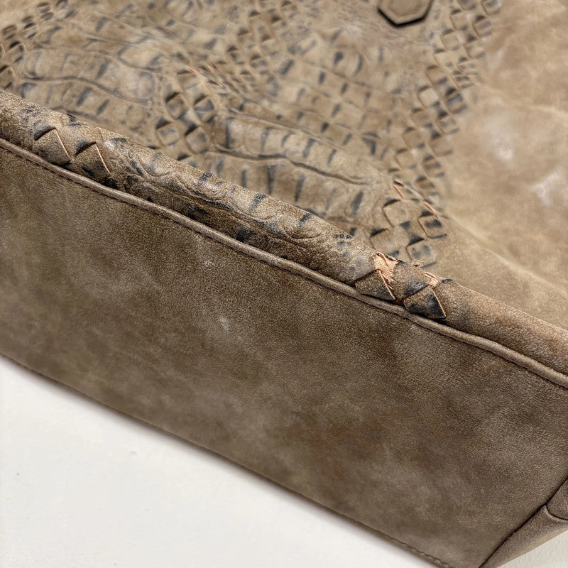 brown textured snake skin bag