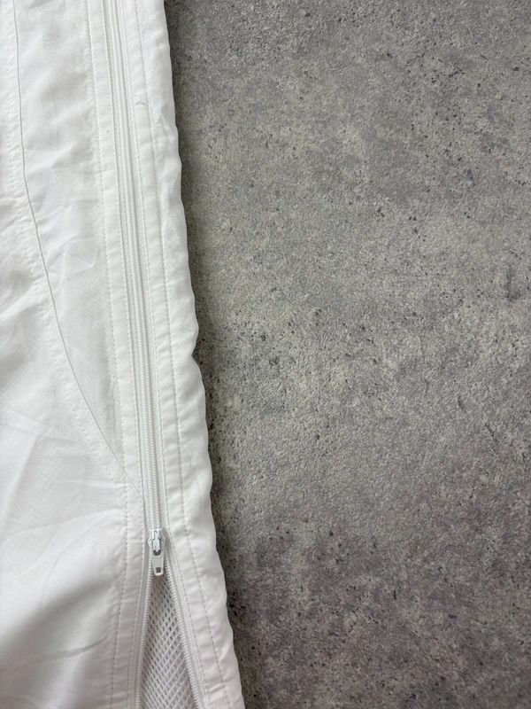 low rise white Reebok tracksuit bottoms