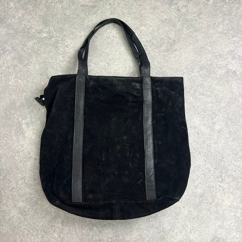 Black suede tote bag with gold studded spikes