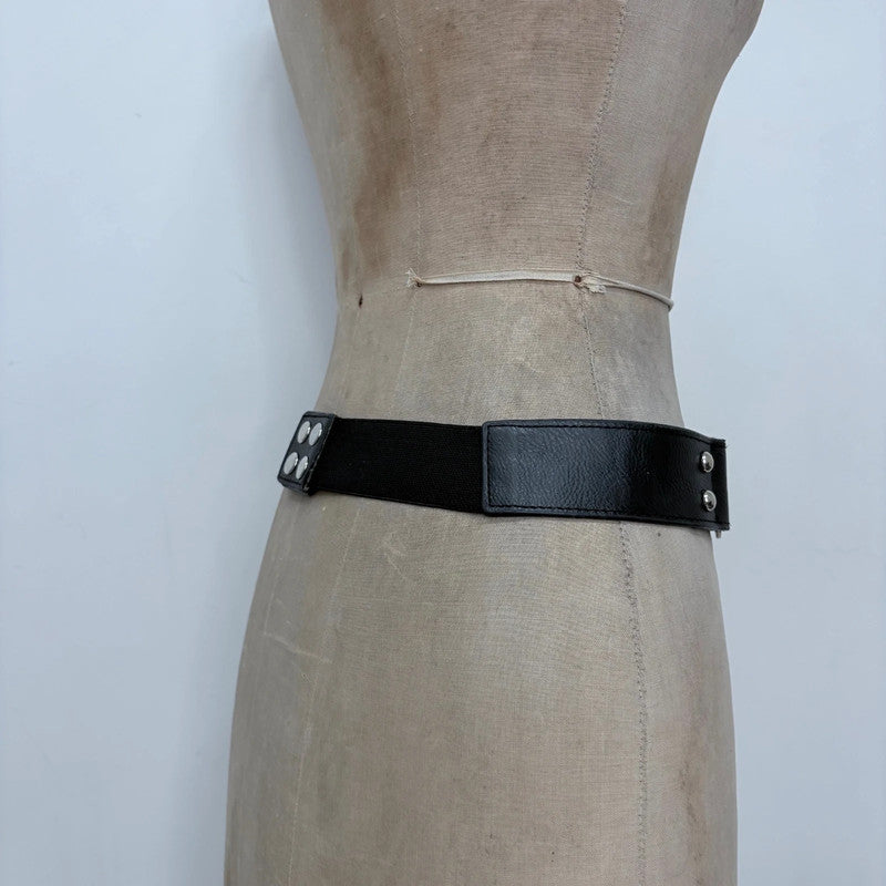 black faux leather silver spellout belt