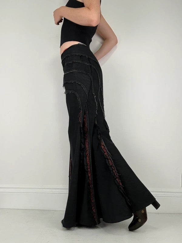 Flared black distressed maxi skirt