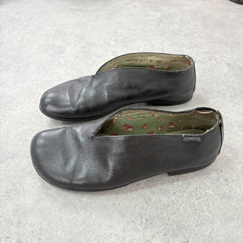 Black leather camper ballet flats