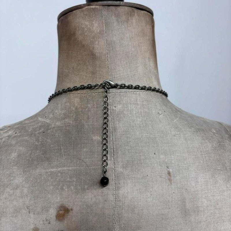 Delicate beaded charm necklace