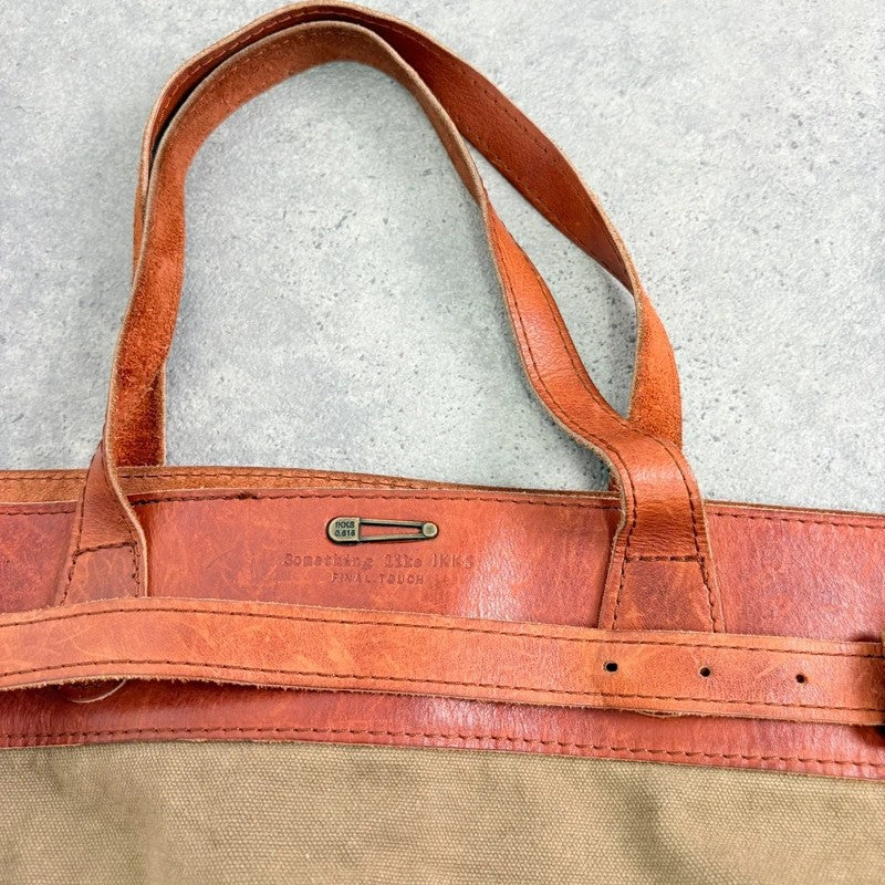 Slouchy oversized leather and canvas shoulder bag