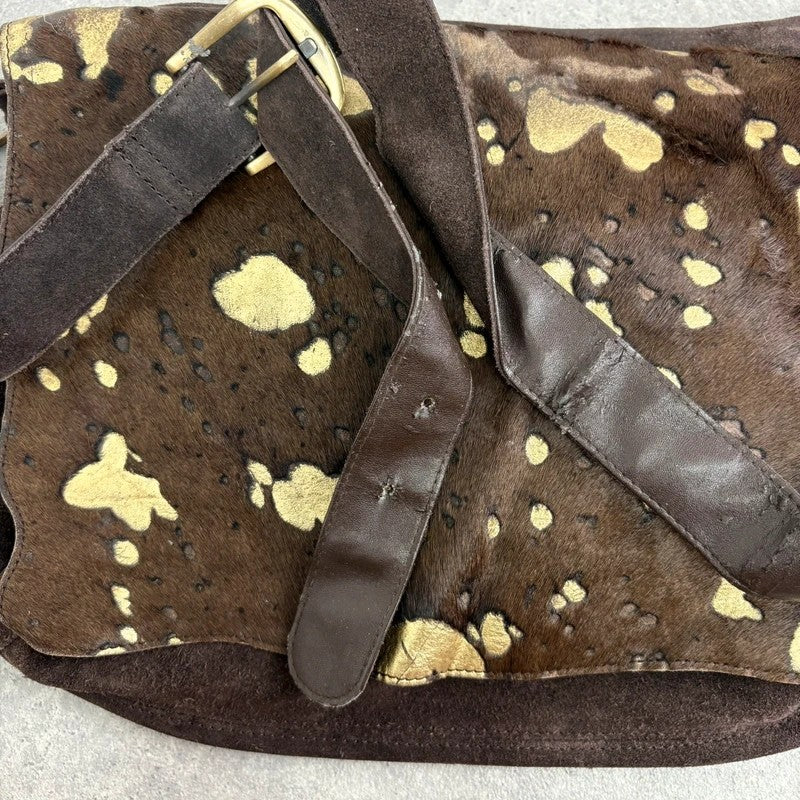 Brown cow hide leather satchel bag with gold embellishment