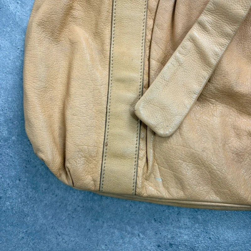 Cream yellow leather knot pleated handbag