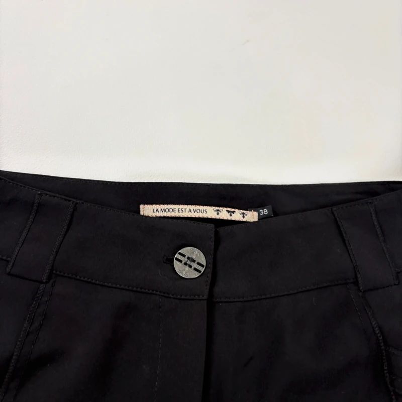 black pleated tech trousers