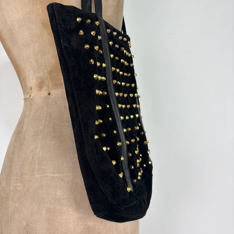 Black suede tote bag with gold studded spikes