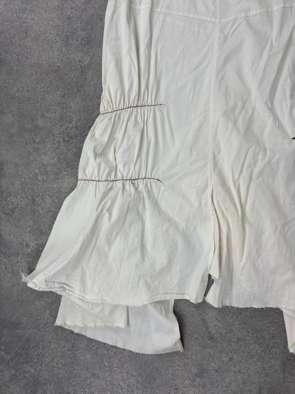 pleated white asymmetric flared maxi skirt