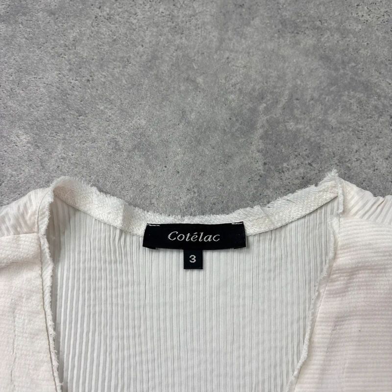 white cotton pleated blouse