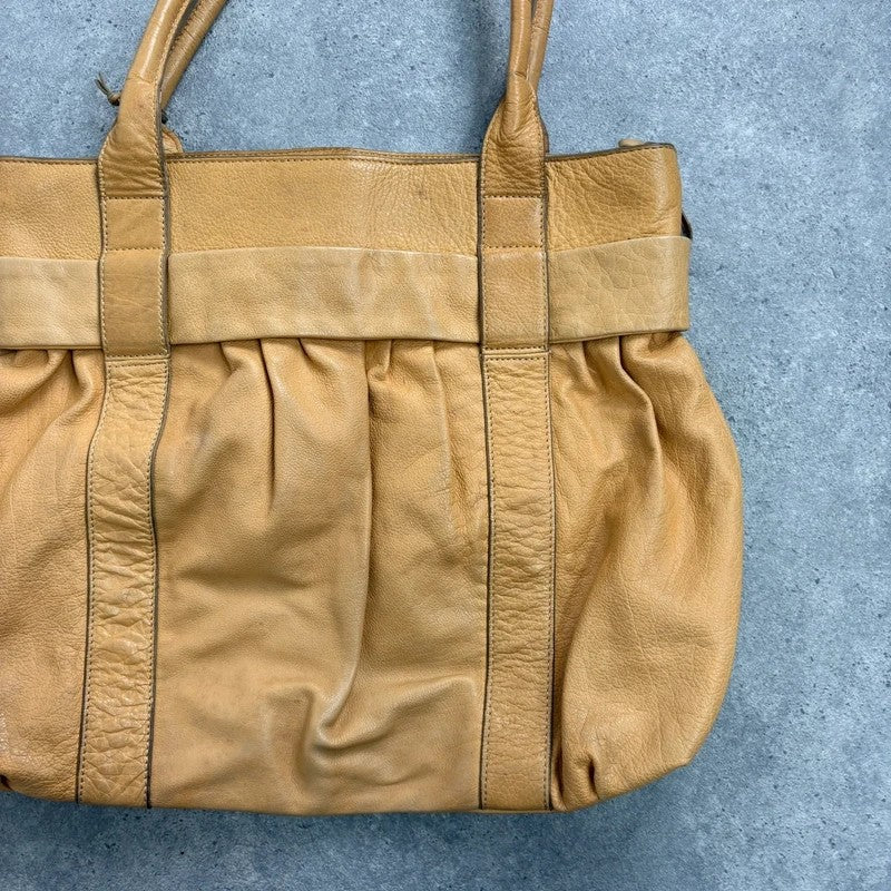 Cream yellow leather knot pleated handbag
