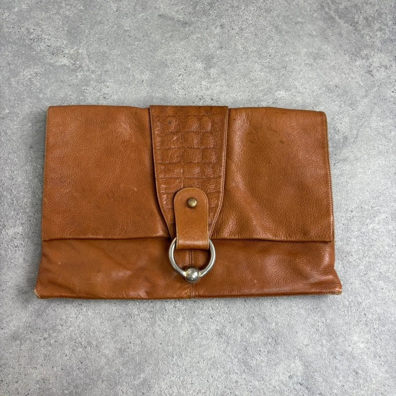 tan lather piercing punky silver hardware clutch bag