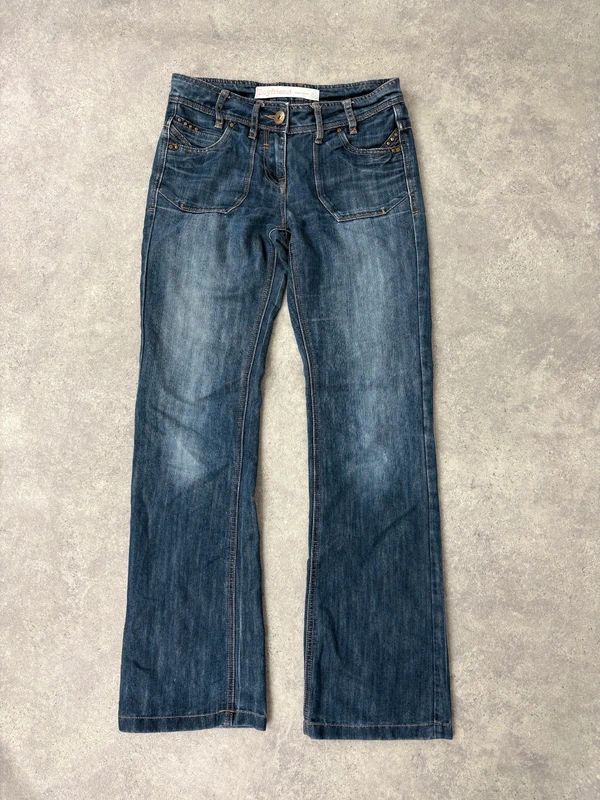 Low rise distressed buckle back Jeans