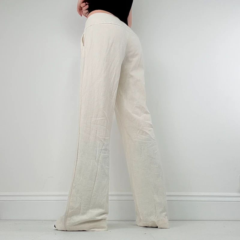 white flared wide leg thick waistband trousers