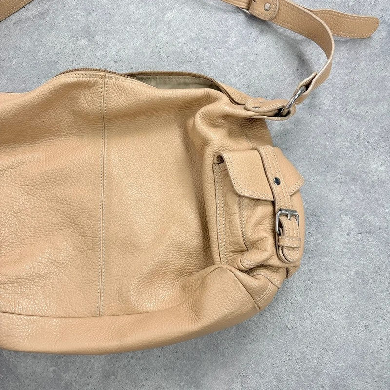 Slouchy cream leather cargo pocket satchel bag