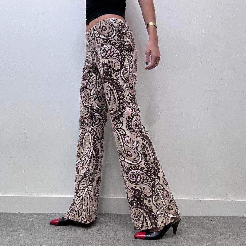 brown paisley patterned flared cord trousers