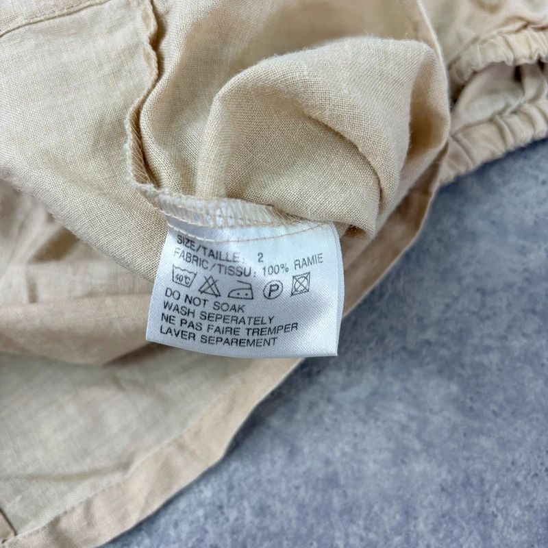 tan linen pleated button through slouchy blouse