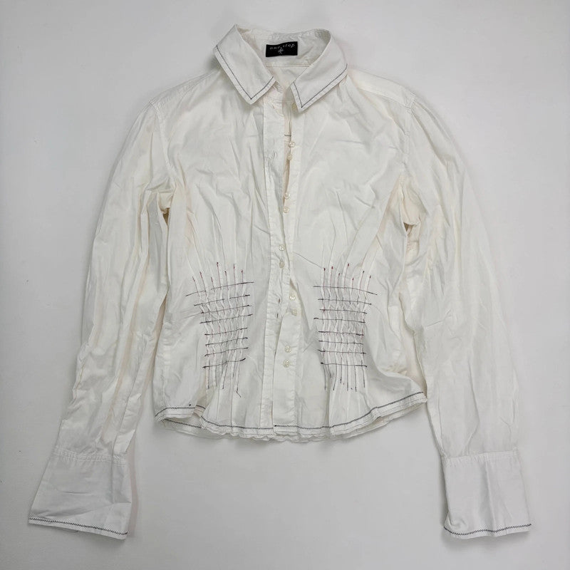 white cinched pleated flared shirt