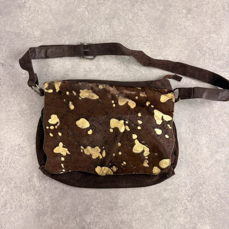 Brown cow hide leather satchel bag with gold embellishment