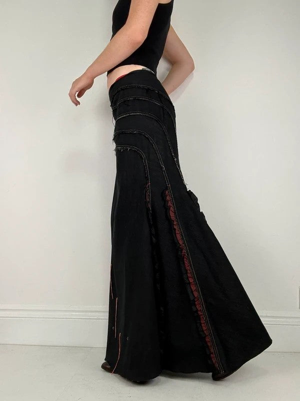 Flared black distressed maxi skirt