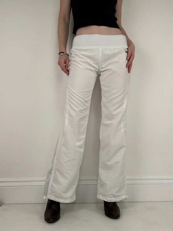 low rise white Reebok tracksuit bottoms