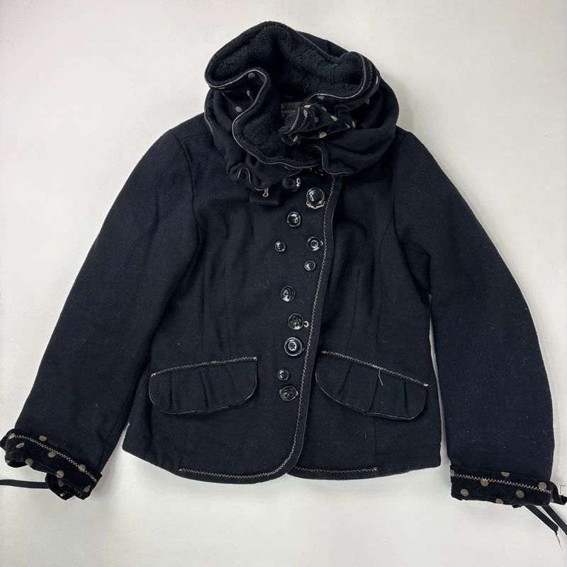 black structured asymmetric polkadot coat