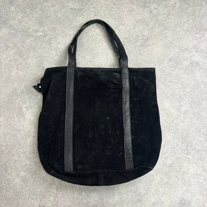 Black suede tote bag with gold studded spikes