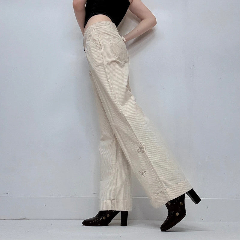 cop copine pleated front pinstripe trousers