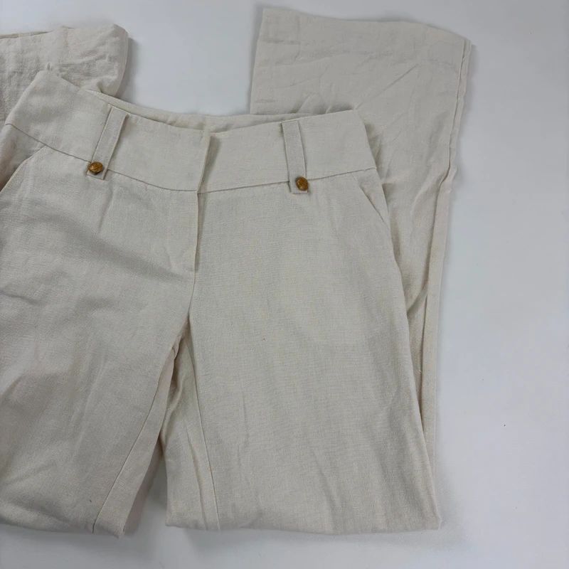 white flared wide leg thick waistband trousers