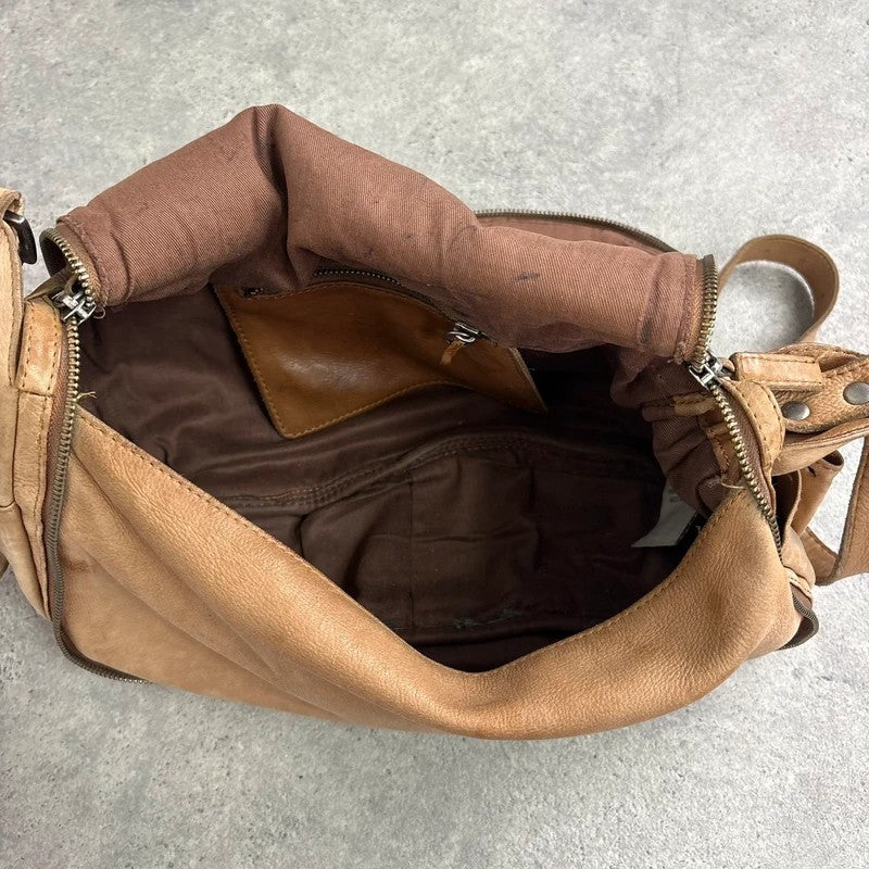 Tan distressed leather zip city crossbody D-ring bag
