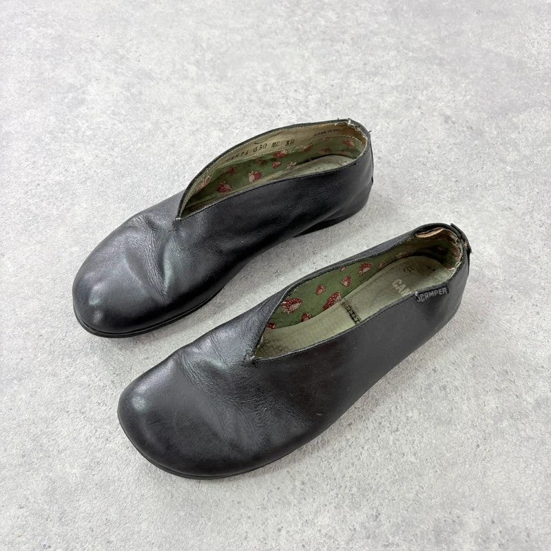 Black leather camper ballet flats