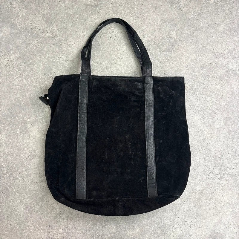 Black suede tote bag with gold studded spikes
